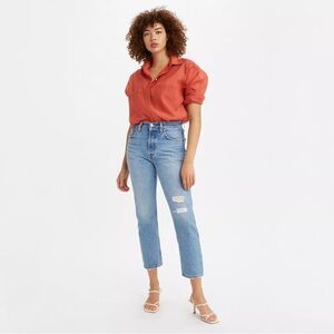 Levi’s 501 Cropped Denim in Light Blue with Distressing